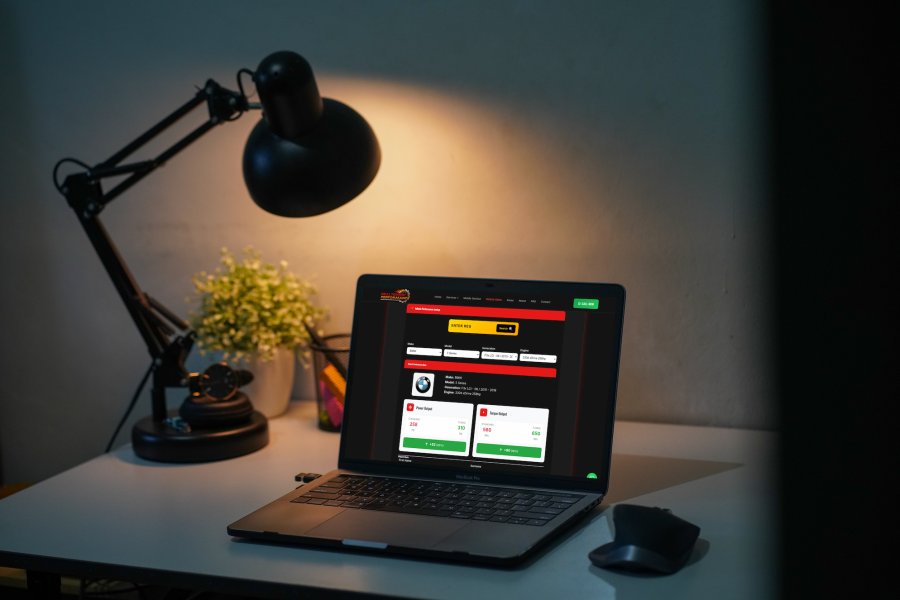 Vehicle Gains Lookup tool on a laptop